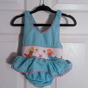 Anavini 6 month smocked swimsuit. Baby blue and white polka dots with Mermaids.